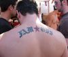 man with back tattoo